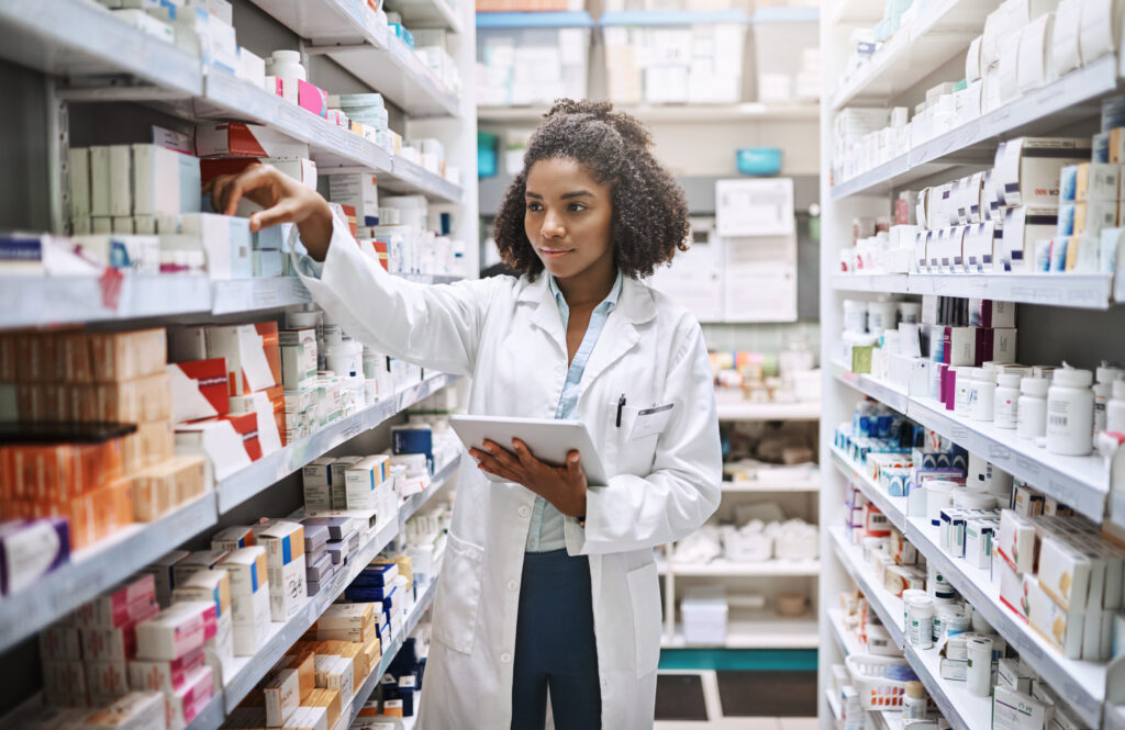never fear your pharmacist is here cropped shot attractive young female pharmacist working pharmacy